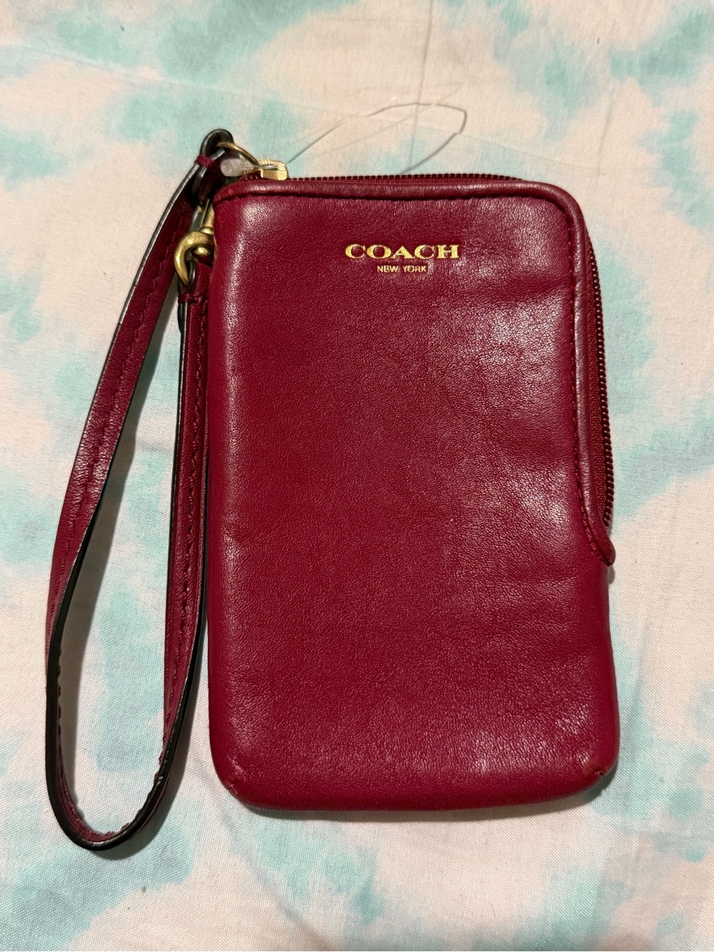 COACH Wine Red Leather Wristlet Phone Pouch with Gold Logo - Picture 1 of 4